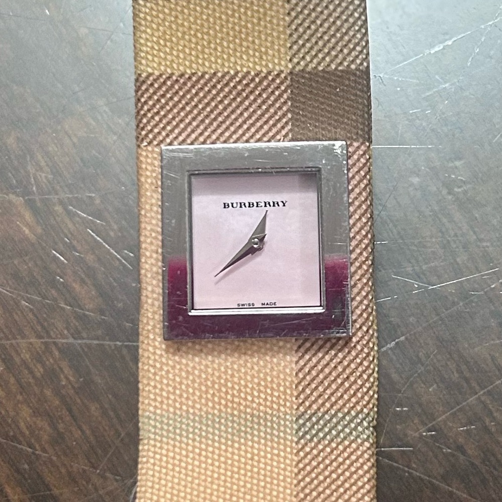 Authentic Burberry watch. Working condition. Strap is coming apart.